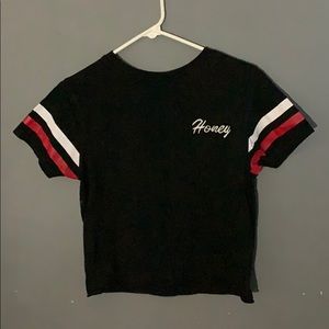 black “honey” shirt w stripes on sleeves.